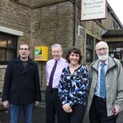 Garth and Derek with Ray and Sue from the Three Crowns launching the new defibrillator